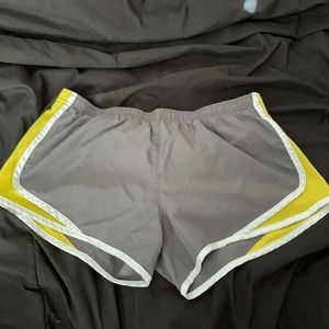 gray and yellow exercise shorts